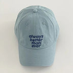 Light blue cap with 'always better than ever' text on a white background