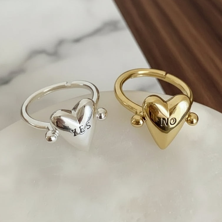 Gold and silver heart-shaped rings.