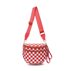 Coral red and white checkered Baye Bag with a red strap on a white background
