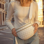 Woman holding a Cream and White Check Baye Bag in an urban setting