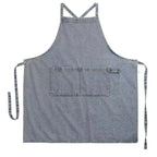 Blue denim apron on a white background
