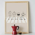 Framed artwork of coffee-themed figures on a white background