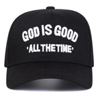 Black cap with 'GOD IS GOOD ALL THE TIME' text on a white background