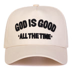 Cream cap with 'God is Good All the Time' text on a white background