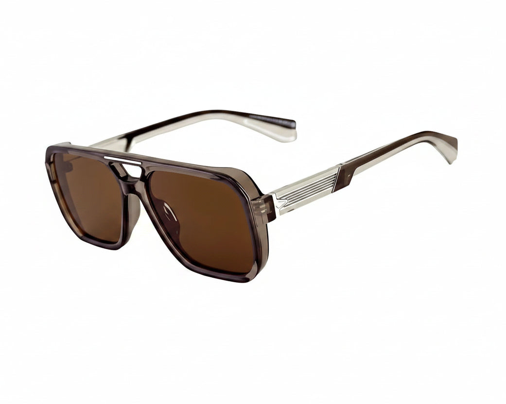 Sunglasses with brown lenses and gold frame on a white background