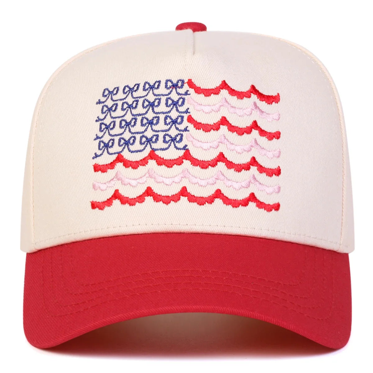 Cap with red, white, and blue embroidered patterns on a white background