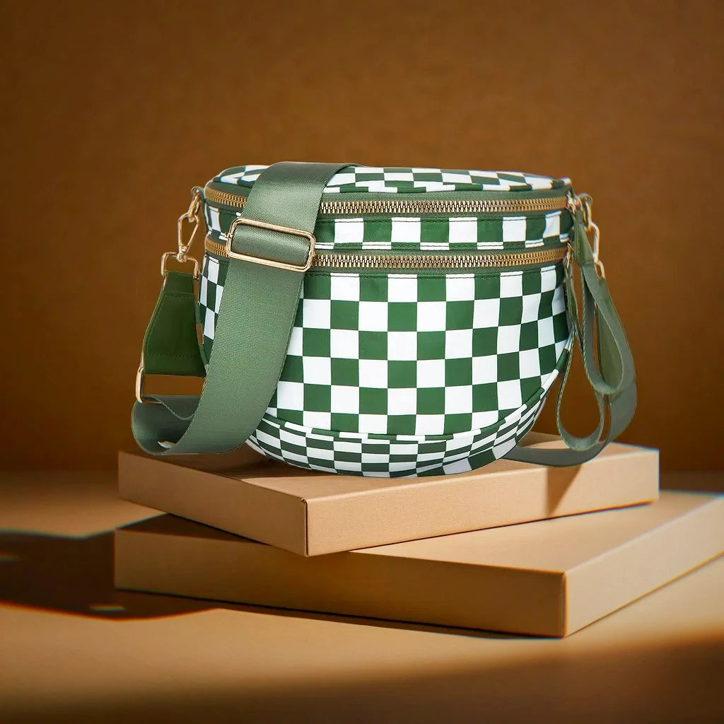 Green and white checkered Baye bag with green strap on a brown surface