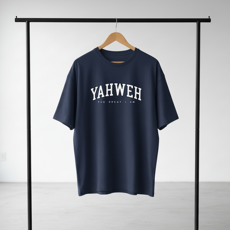 Navy blue t-shirt with 'YAHWEH' printed on it, hanging on a rack against a plain background.