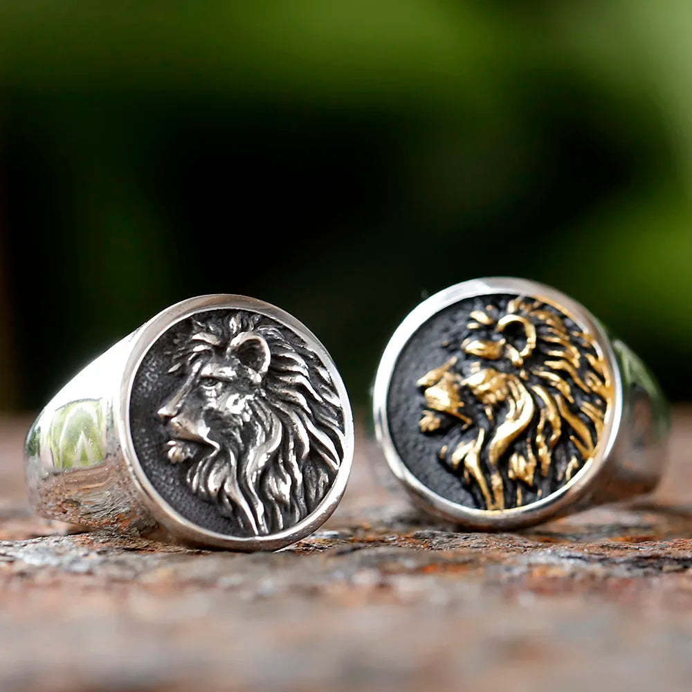 Two, Lion of Judah Signet Rings. One silver and one with gold detailing.
