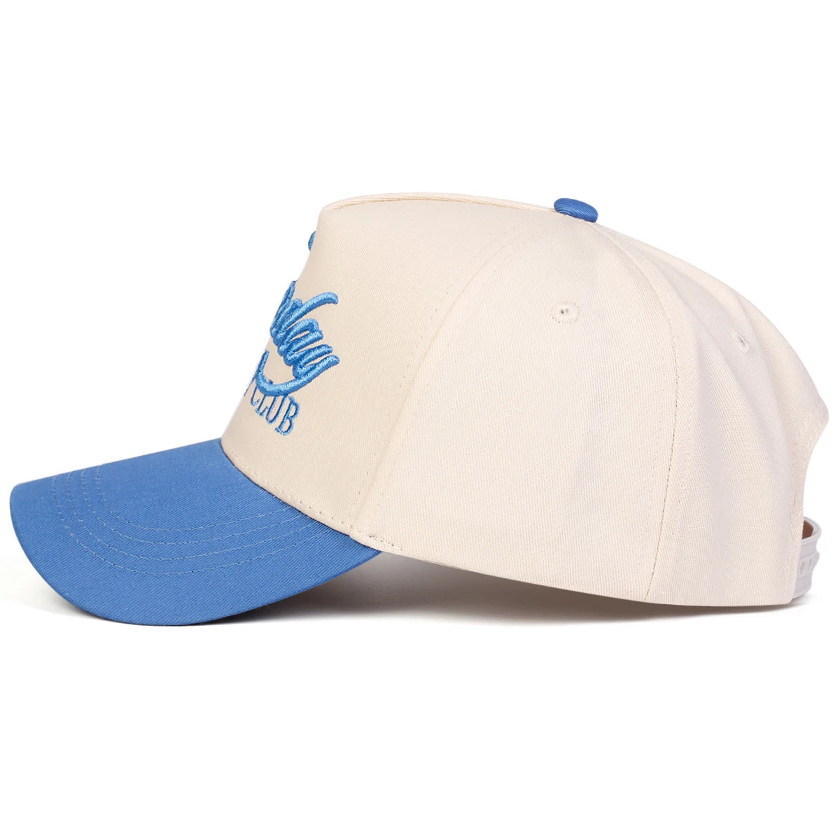 Two-tone cap with blue brim and beige top on a white background